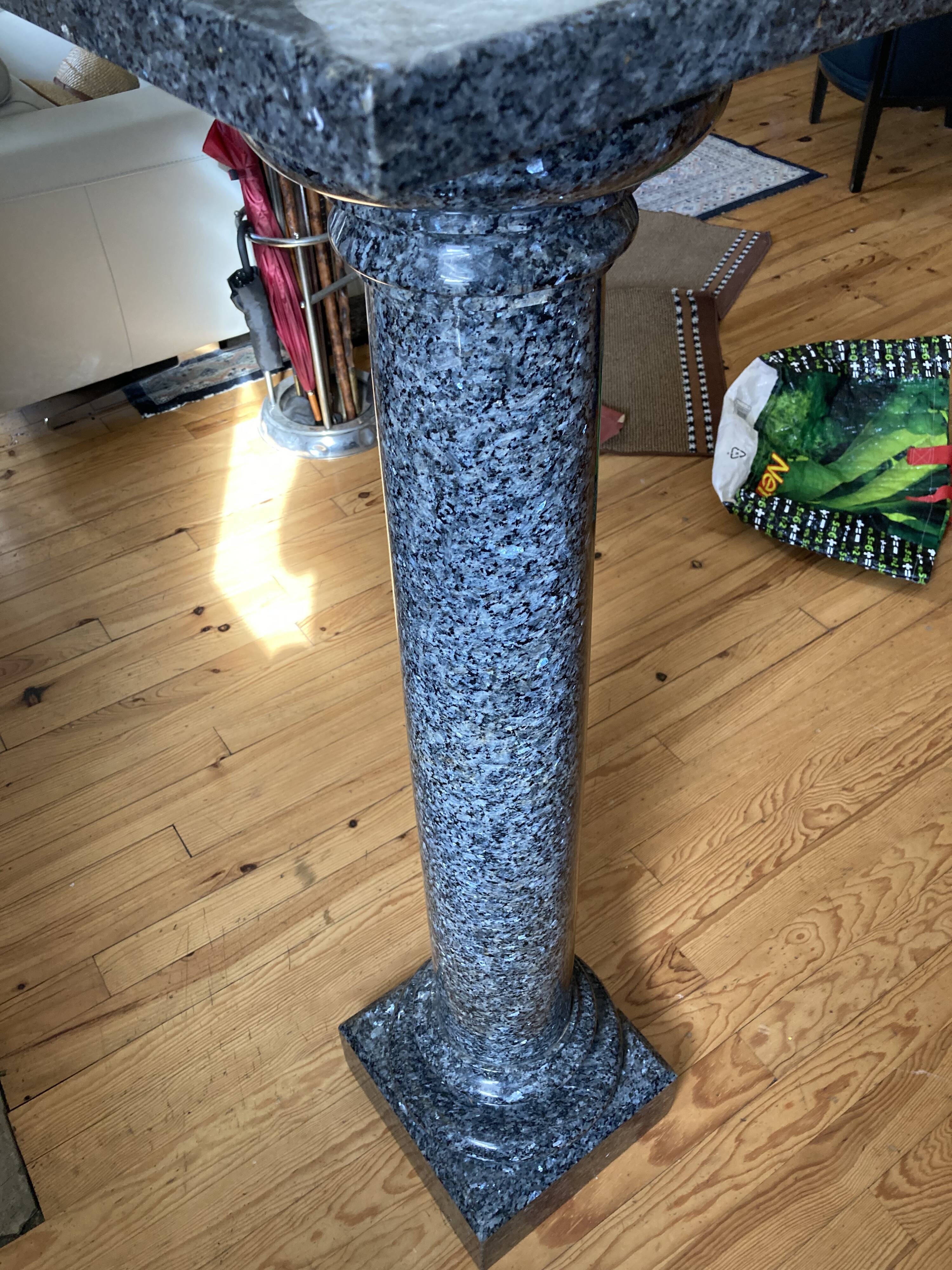 Granite column with pearly reflections
