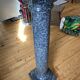 Granite column with pearly reflections