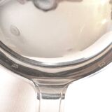 Silver plated metal service: 12 soup spoons, 12 forks and ladle.