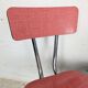 Pair of red Formica chairs with chrome legs