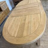 Oval farmhouse table in solid oak with extensions.