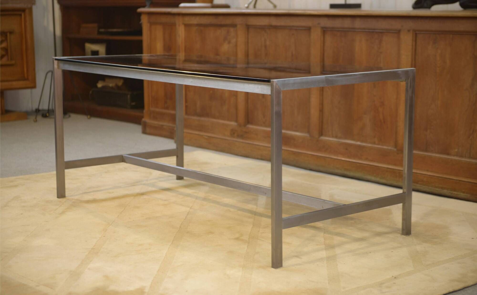 Brushed stainless steel and smoked black glass desk from the 1980s.