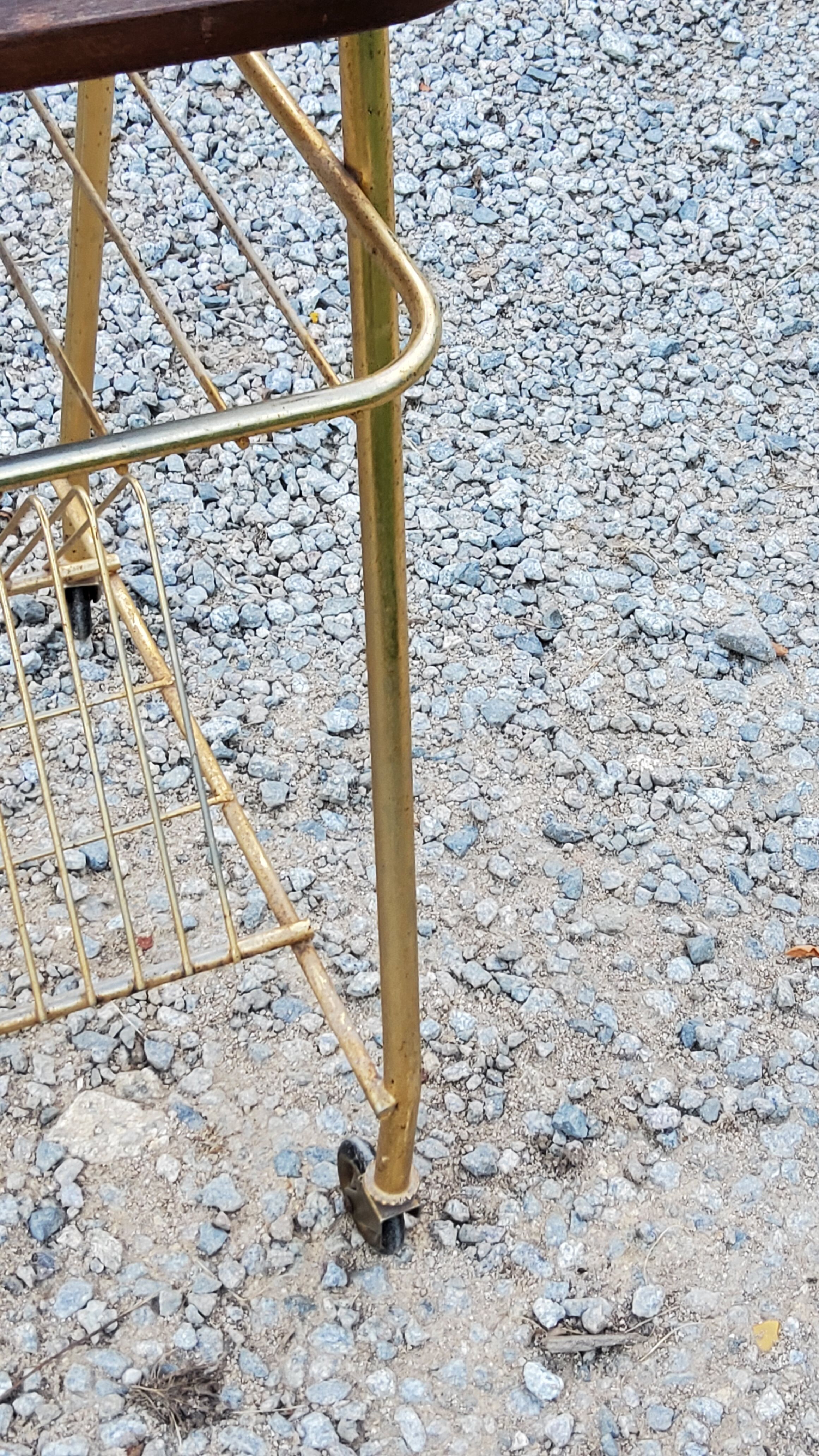 Side table of the 60s mahogany and gold metal range discs