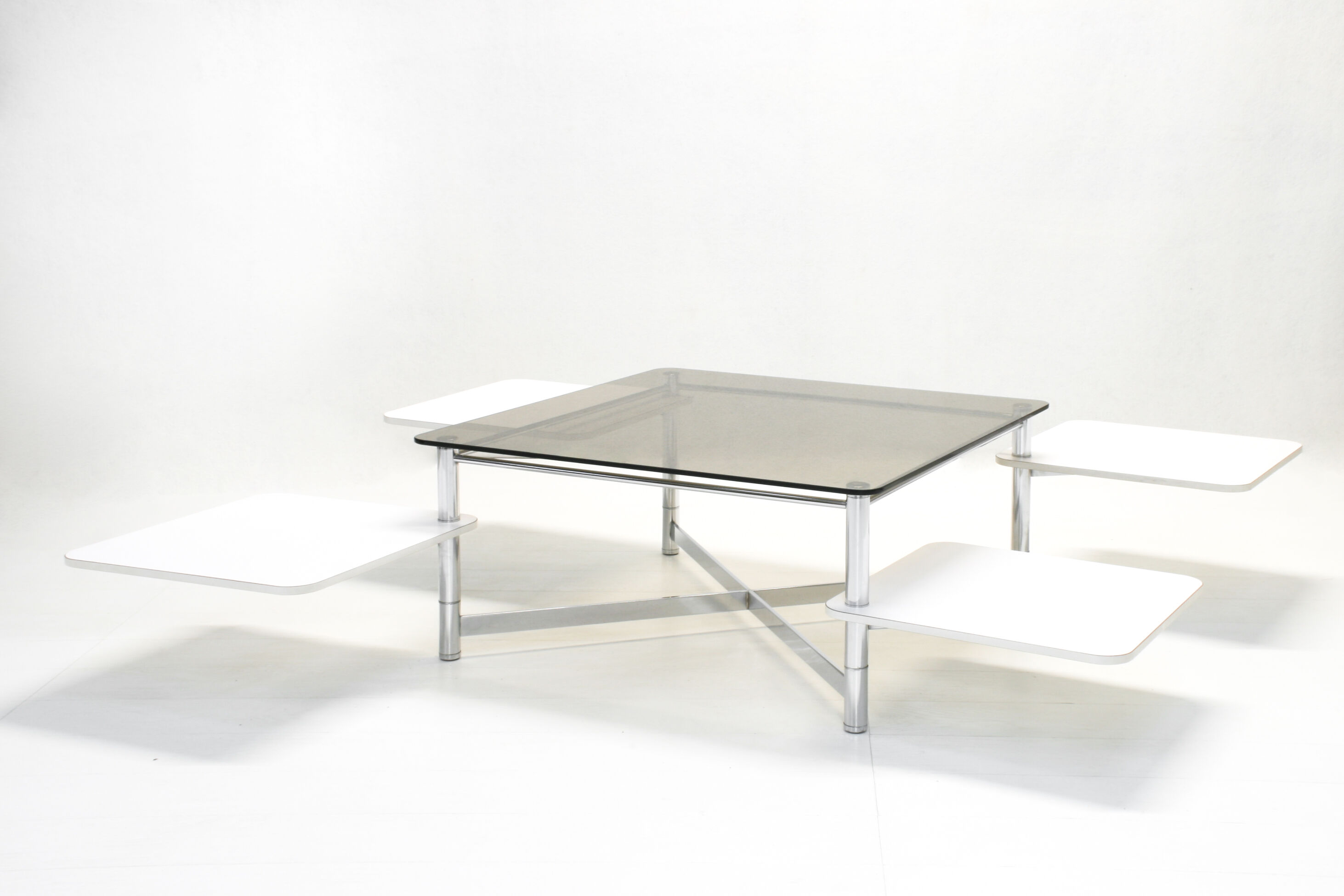 Vintage 1970s smoked glass swivel platform coffee table