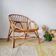 Fauteuil corbeille vintage en rotin – années 60