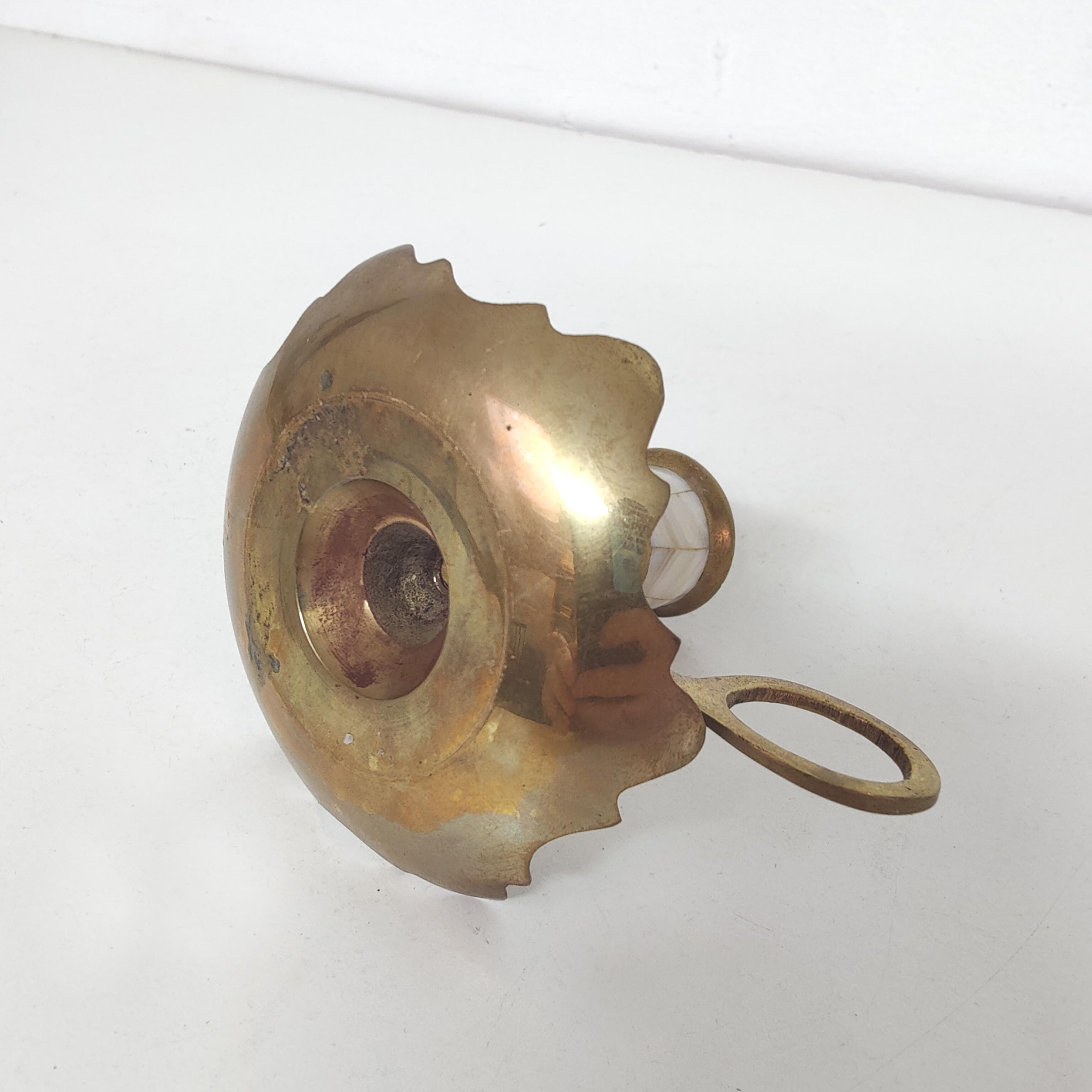 Brass and mother-of-pearl candle holder