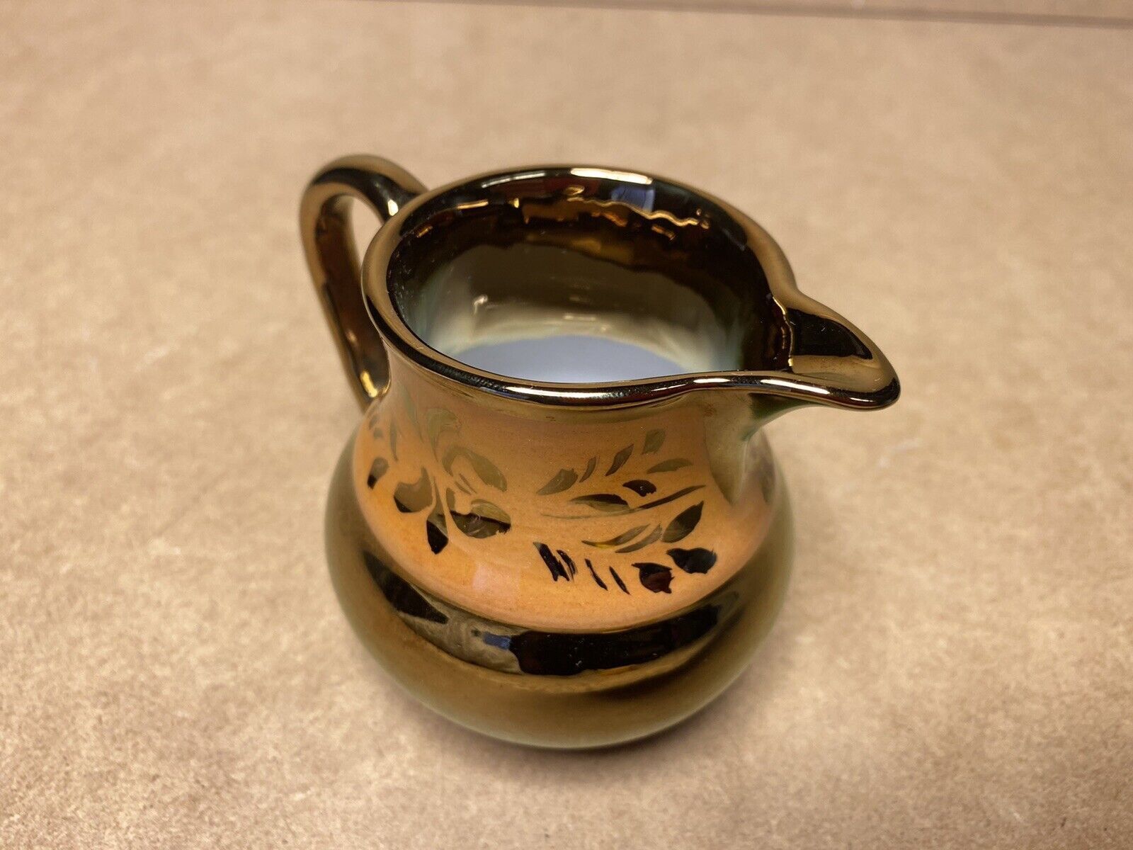 Old milk jug jersey earthenware / english lustrous faience