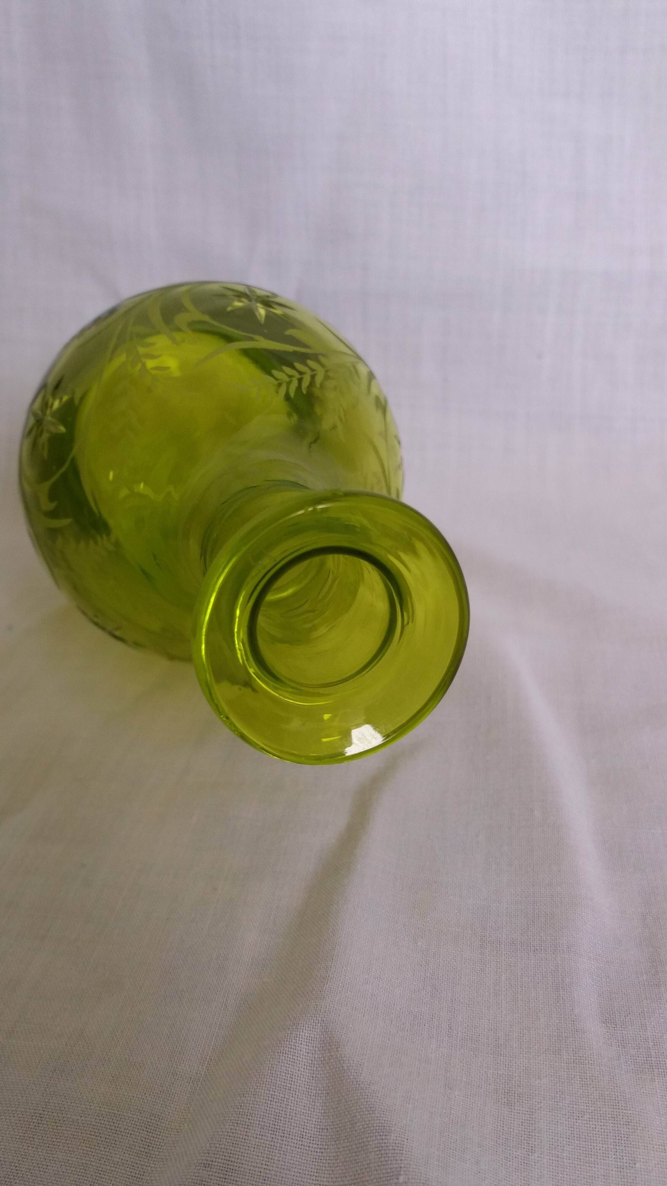 Cut and engraved green blown glass carafe vase
