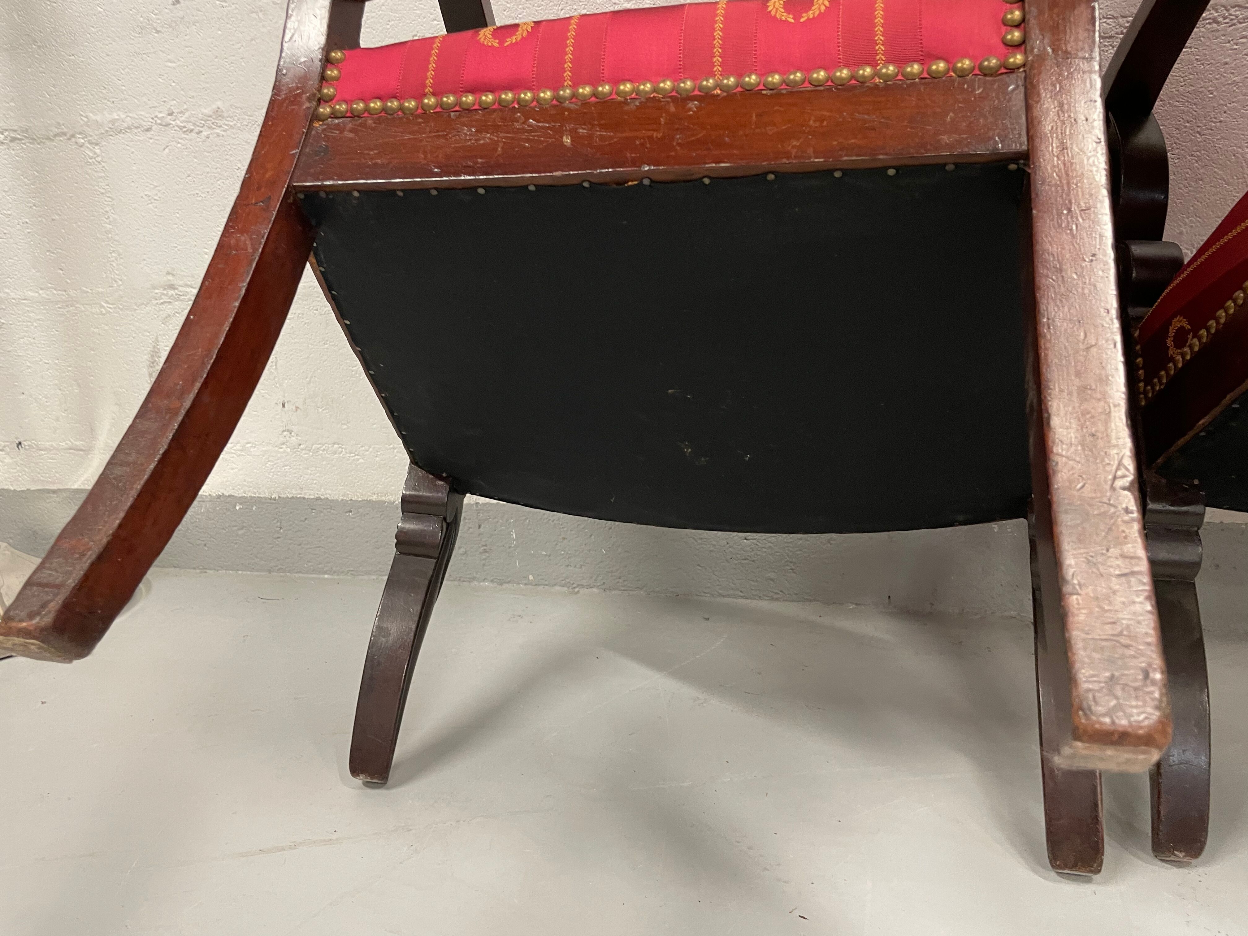 Pair of empire period armchairs in mahogany and silk