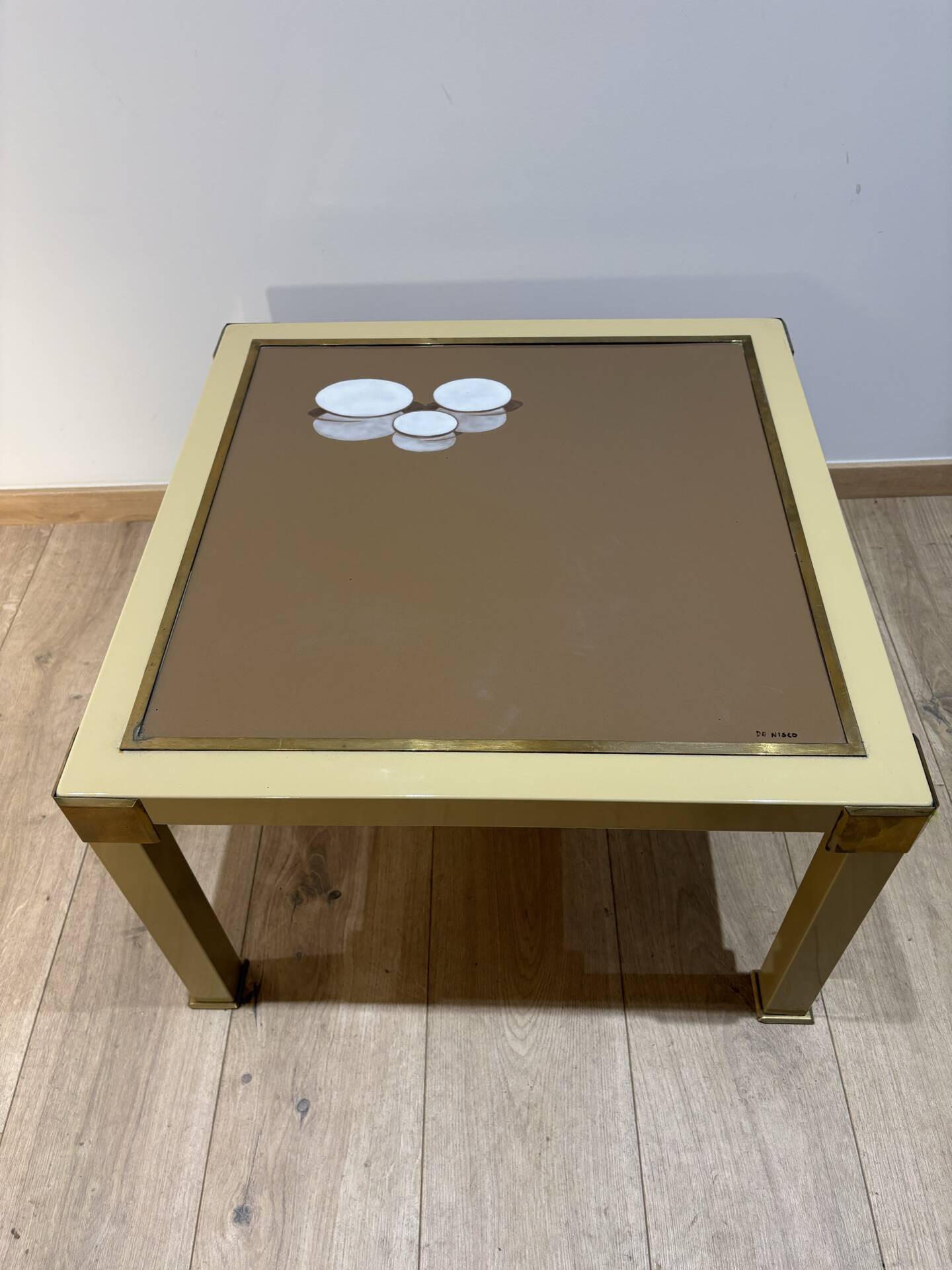 Metal and brass coffee table in ceramic by Nisco.