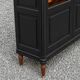 Renovated black antique Louis XVI style display cabinet, glass-fronted bookcase.