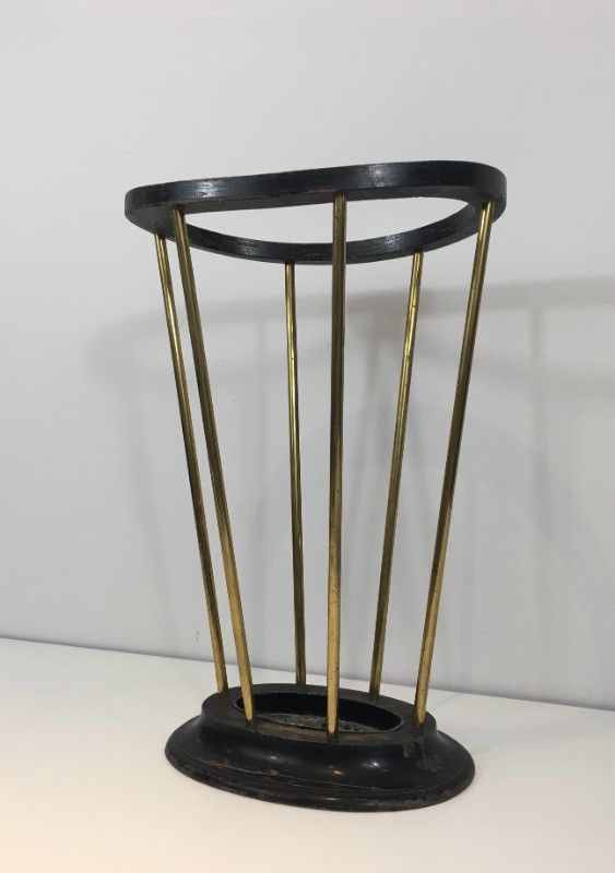 Umbrella stand in blackened wood and brass. Attributed to Jacques Adnet