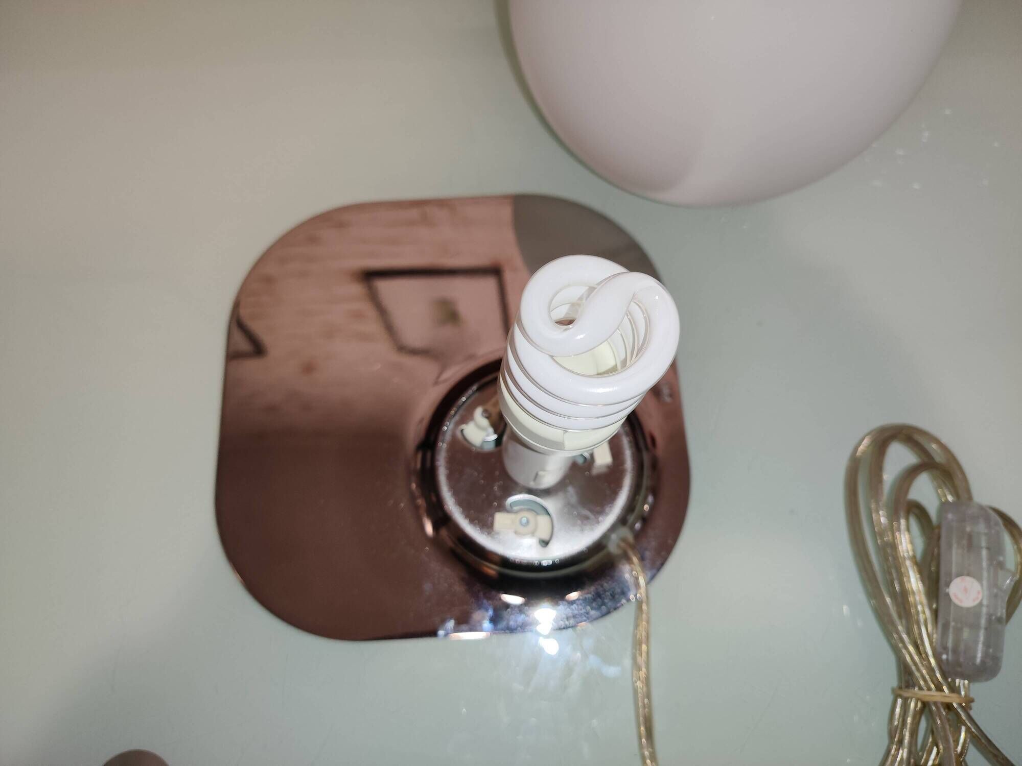White globe lamp retro space age with chrome base. Philips