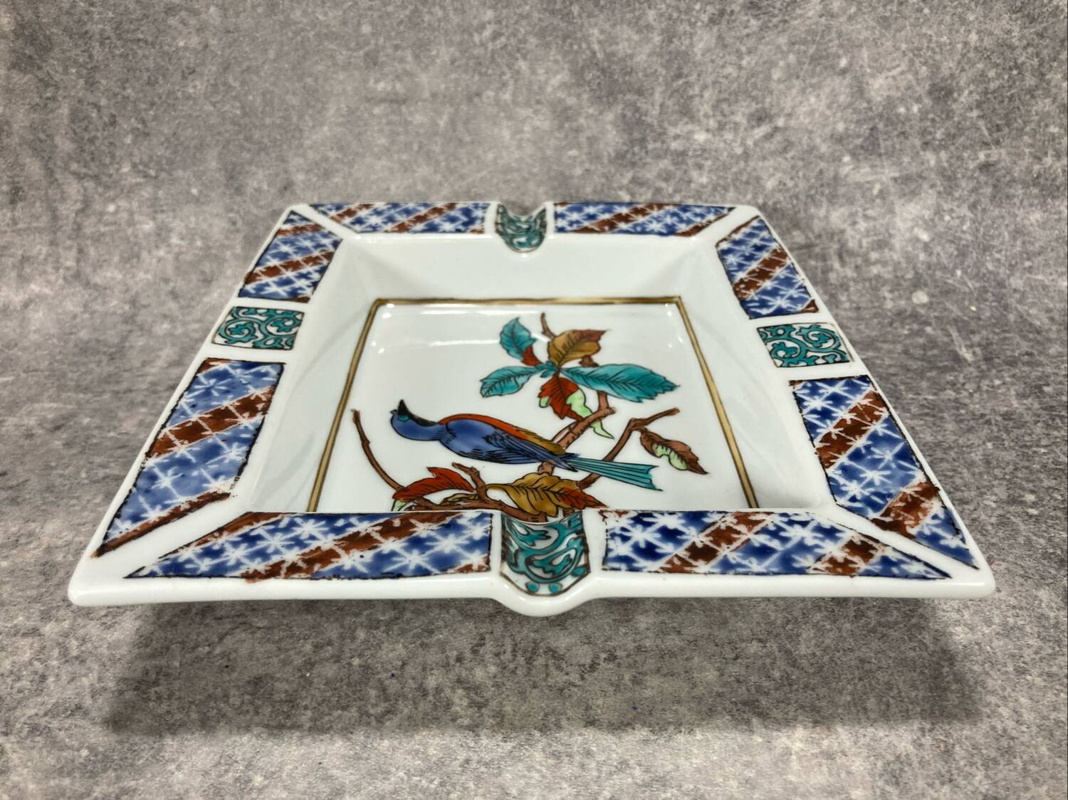 Ashtray. Trinket dish. Japanese porcelain. Blue bird on an autumn branch