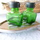 Salt/pepper green glass jars on metal base