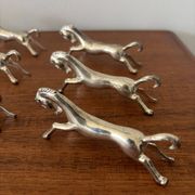 Set of 6 vintage galloping horse knife rests in silver-plated metal.