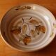 Four bowl-shaped plates in vintage Niderviller stoneware with plant decoration