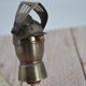 Old silver metal pouring cap