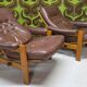 Pair of leather armchairs and an ottoman, Sweden 1970.