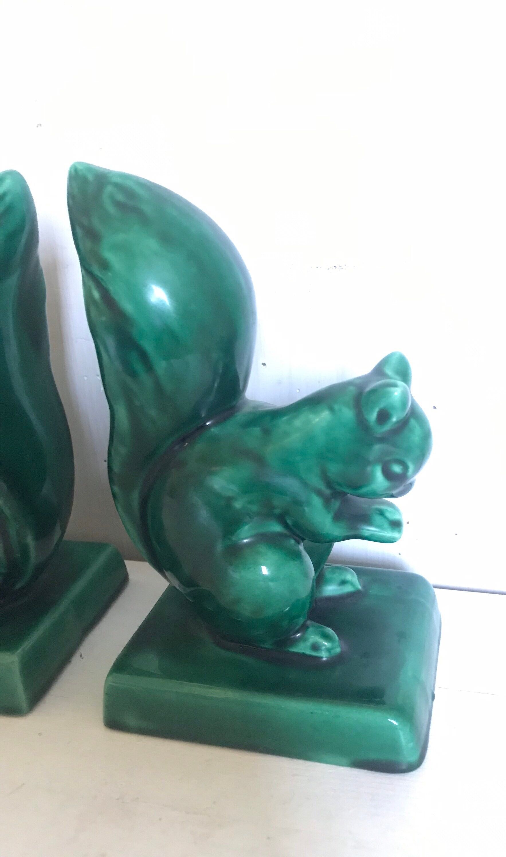 Pair of Art Deco ceramic book clamts