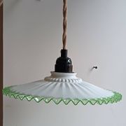 Portable lamp with green and white glass suspension