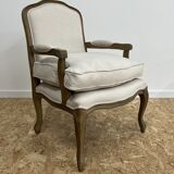 Fauteuil bergère en bois et lin naturel