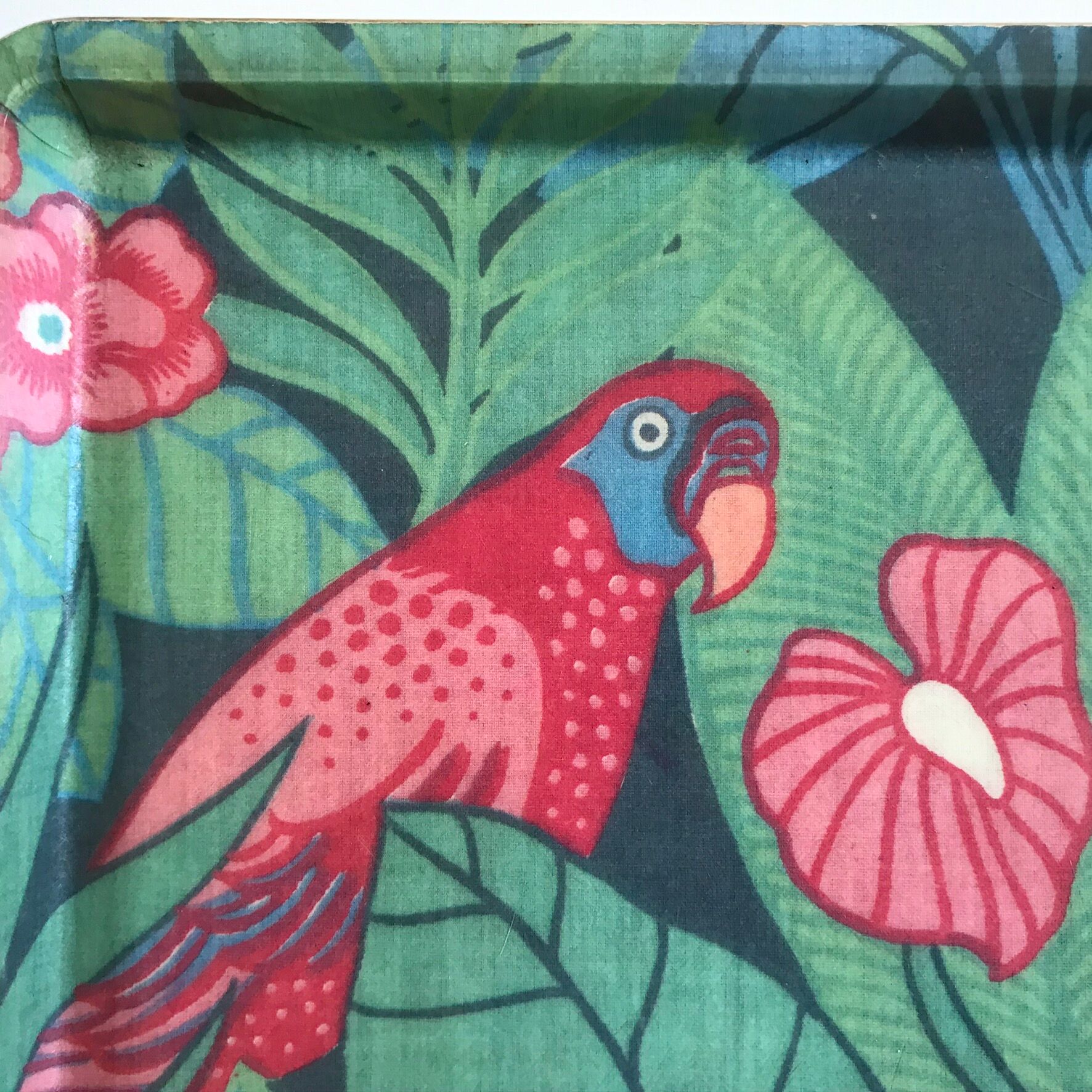 Vintage fiberglass platter with exotic décor and parrots