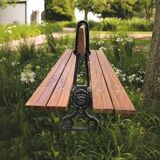 Public garden bench in the city of Paris