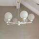 Six-light chrome metal chandelier and opaque glass globes / vintage 60s and 70s