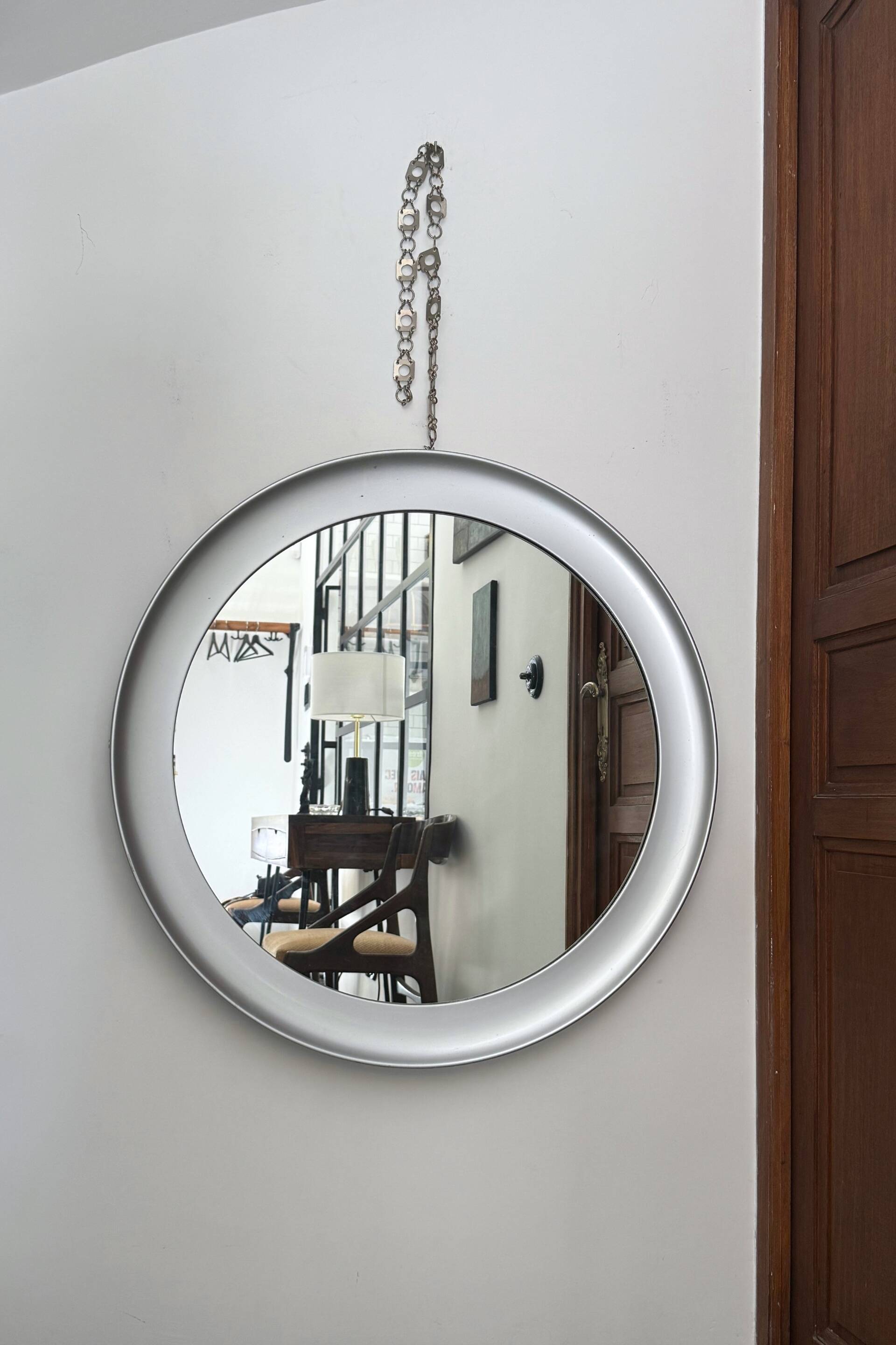 Large round brushed metal mirror by Sergio Mazza for Artemide, 1960s-70s.