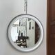 Large round brushed metal mirror by Sergio Mazza for Artemide, 1960s-70s.