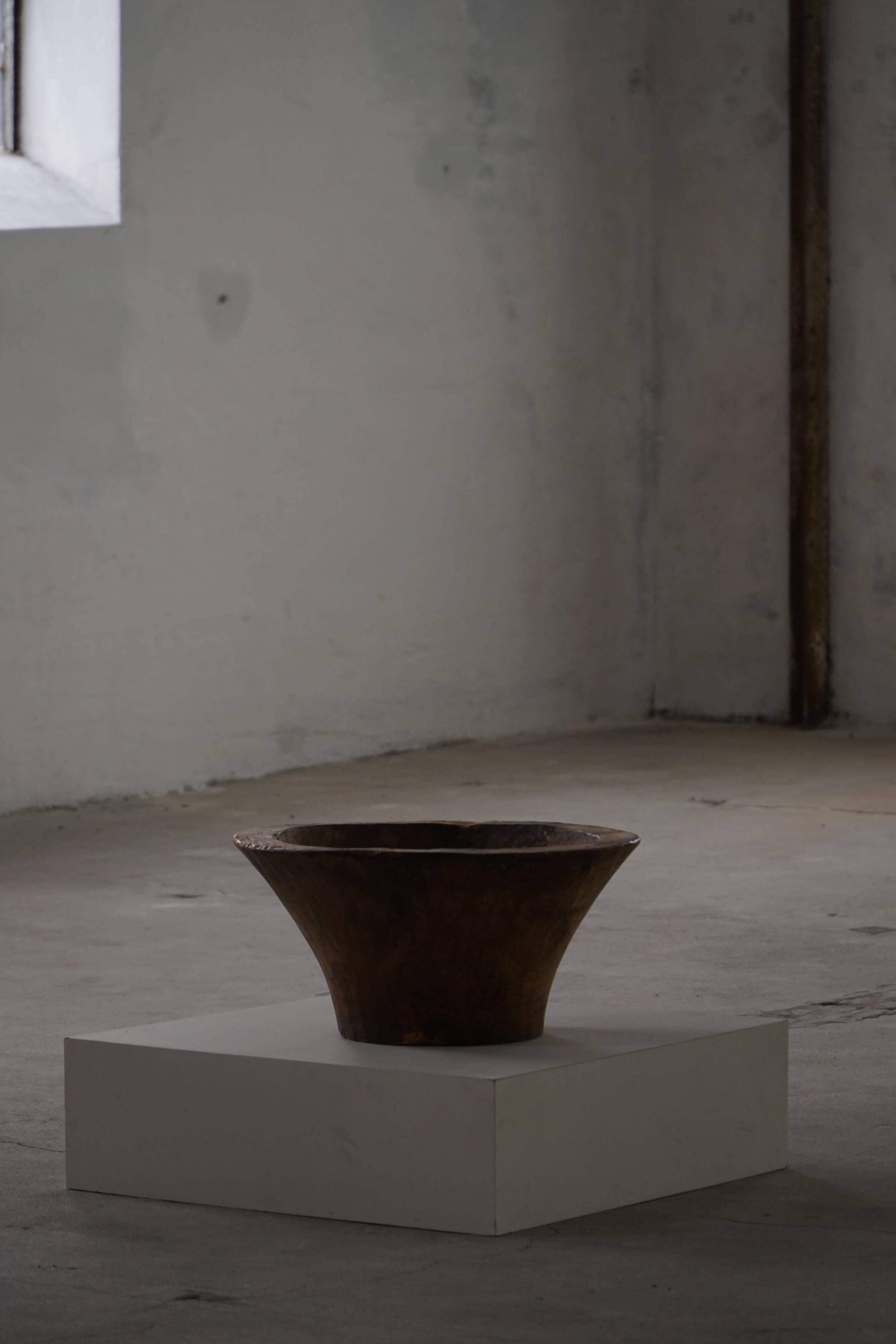 Large hand-carved African wooden bowl, mid-20th century.