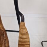 Pair of wicker and iron armchairs by Frederic Weinberg, United States, 1950s.