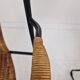 Pair of wicker and iron armchairs by Frederic Weinberg, United States, 1950s.