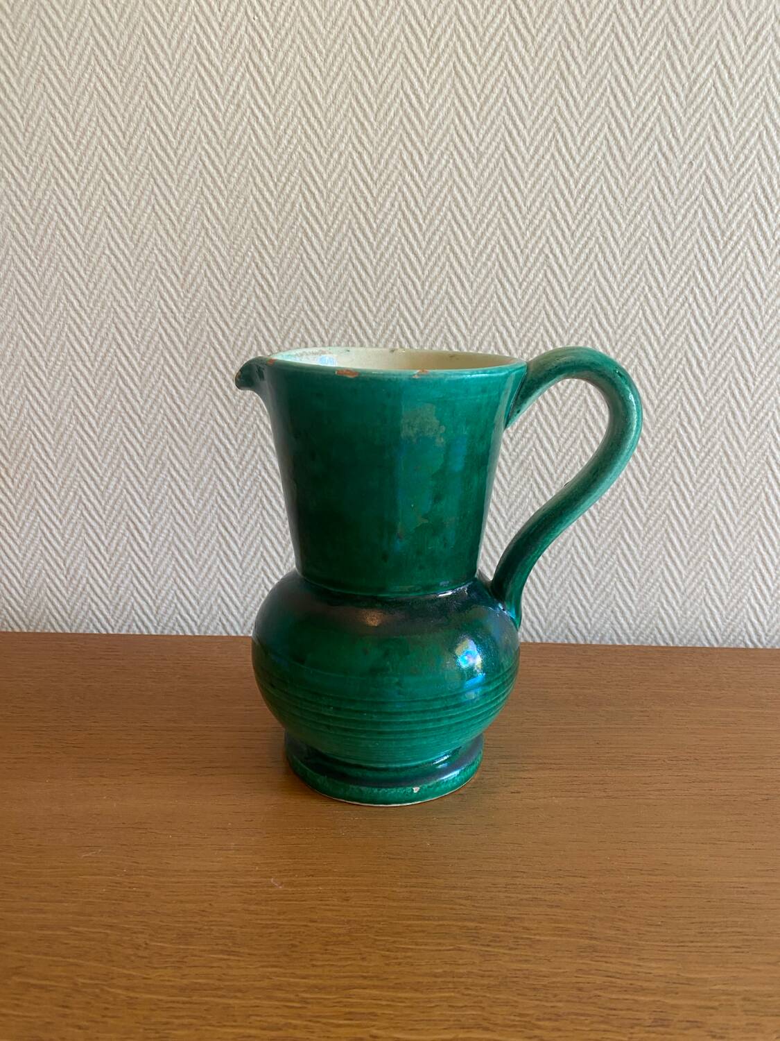 Green glazed ceramic carafe