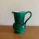 Green glazed ceramic carafe