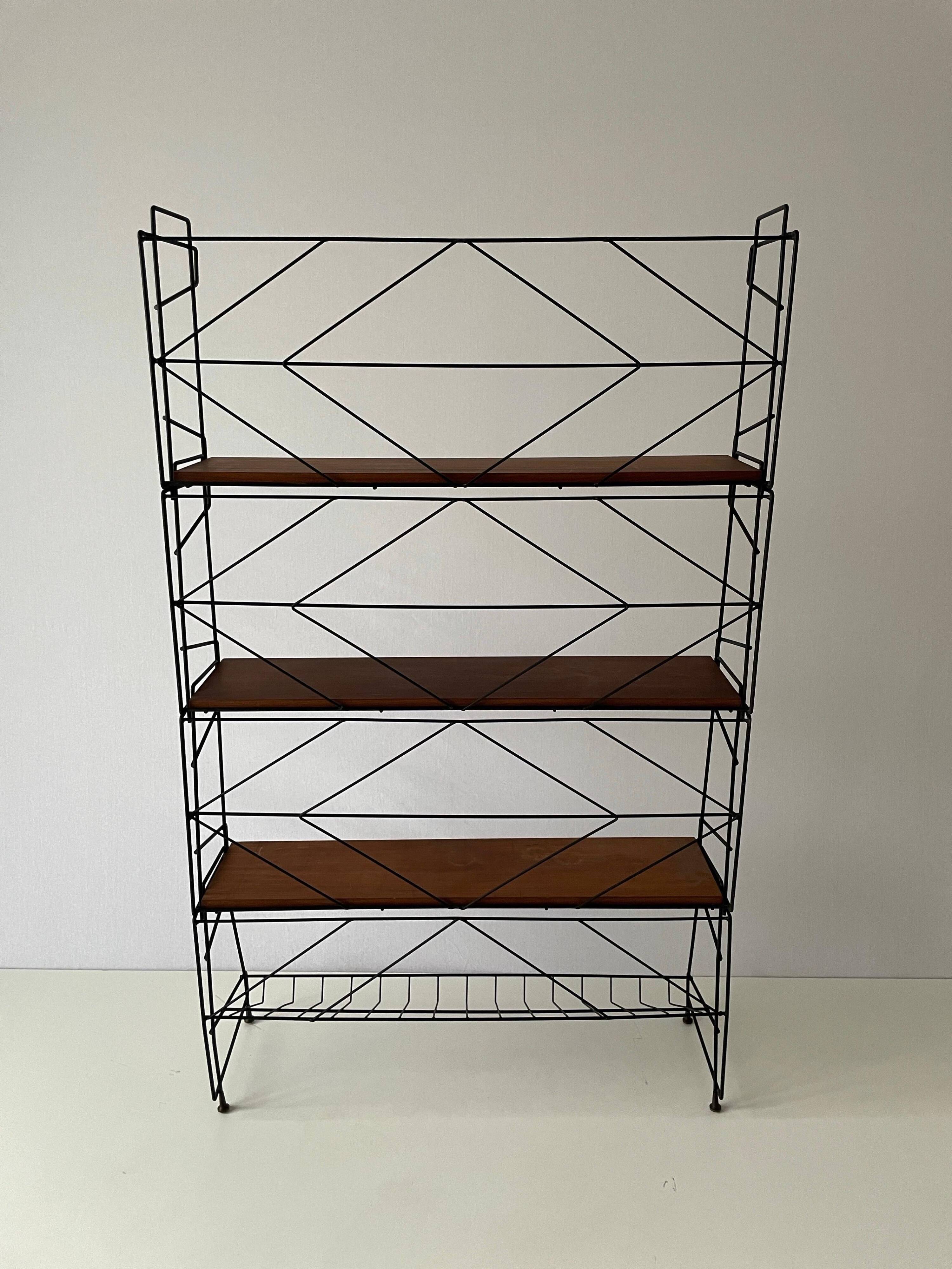 Free-standing shelf with a metal structure and 3 shelves, 1960s, Italy.