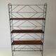 Free-standing shelf with a metal structure and 3 shelves, 1960s, Italy.
