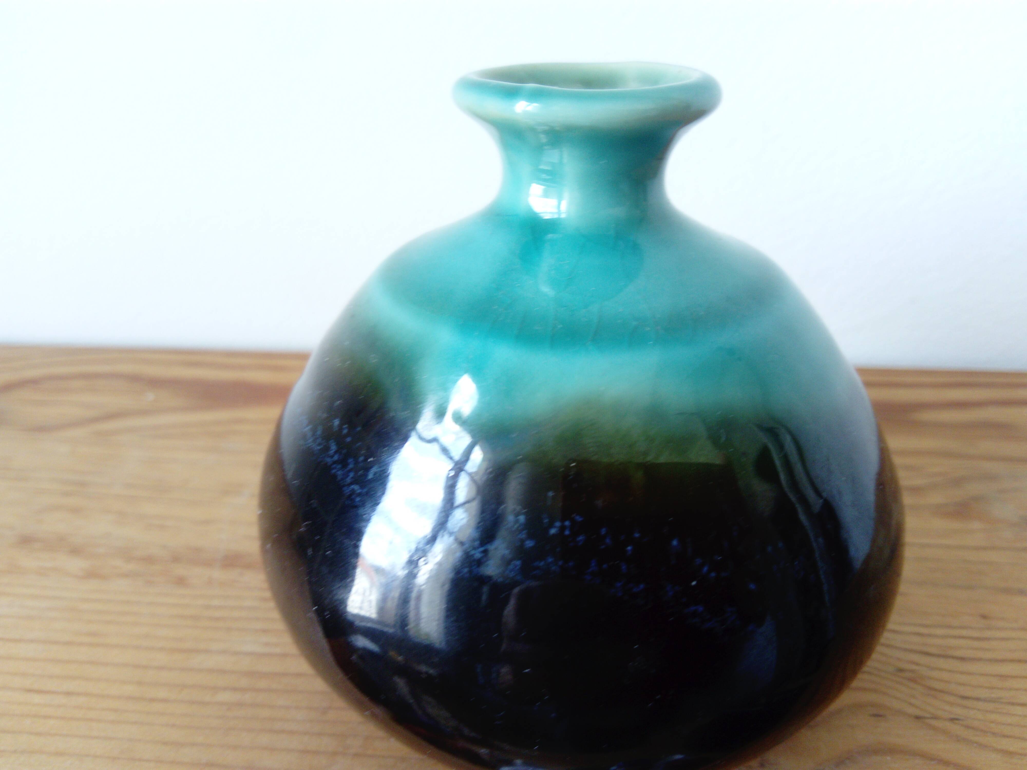 Small brown and turquoise ceramic vase