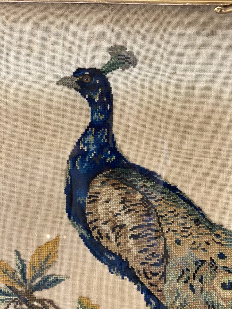 Cross-stitch tapestry in a Louis XVI style frame from around 1900.