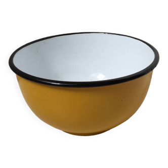Yellow enameled sheet metal bowl from the 1950s