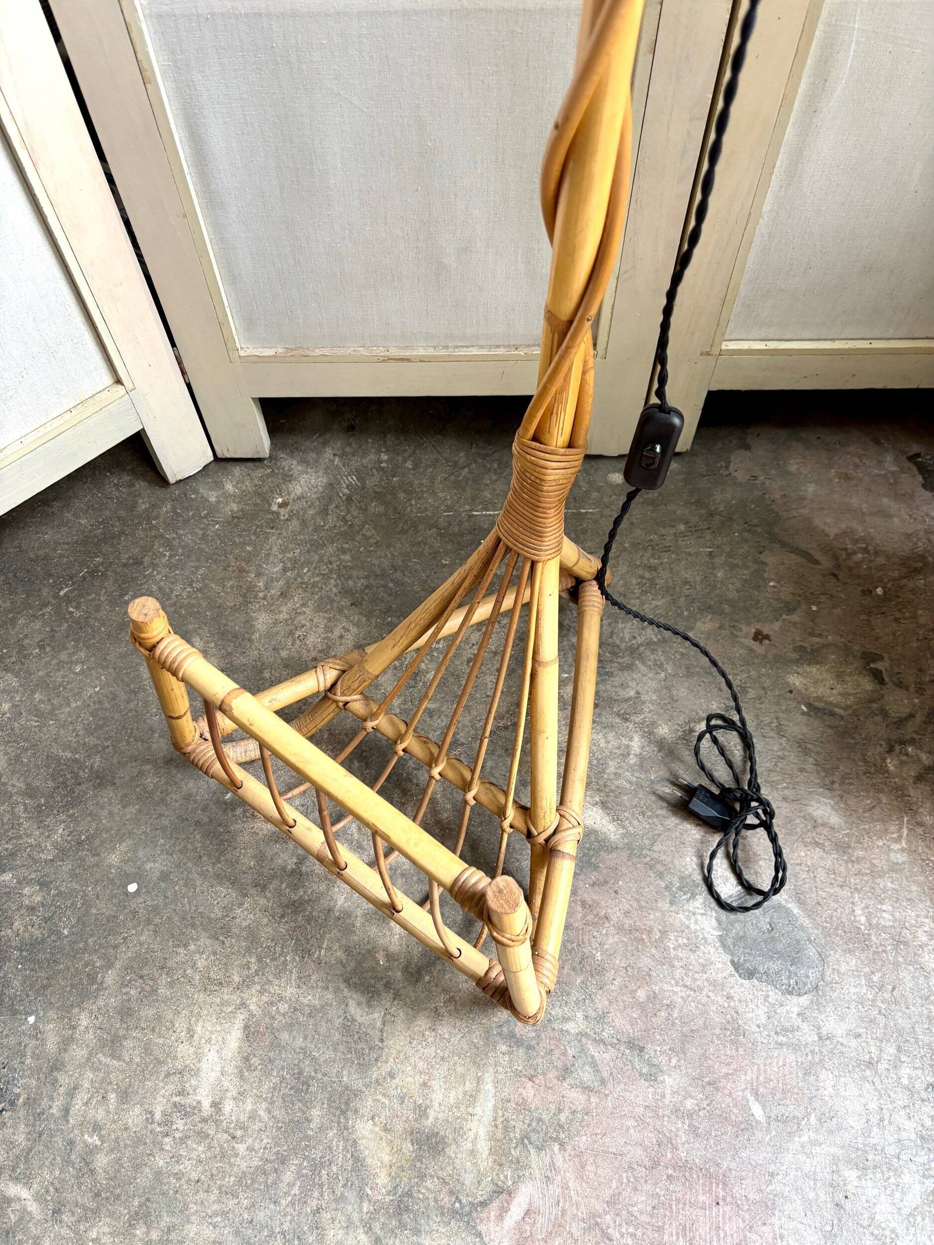 Rattan lamp post base with magazine holder