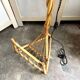 Rattan lamp post base with magazine holder