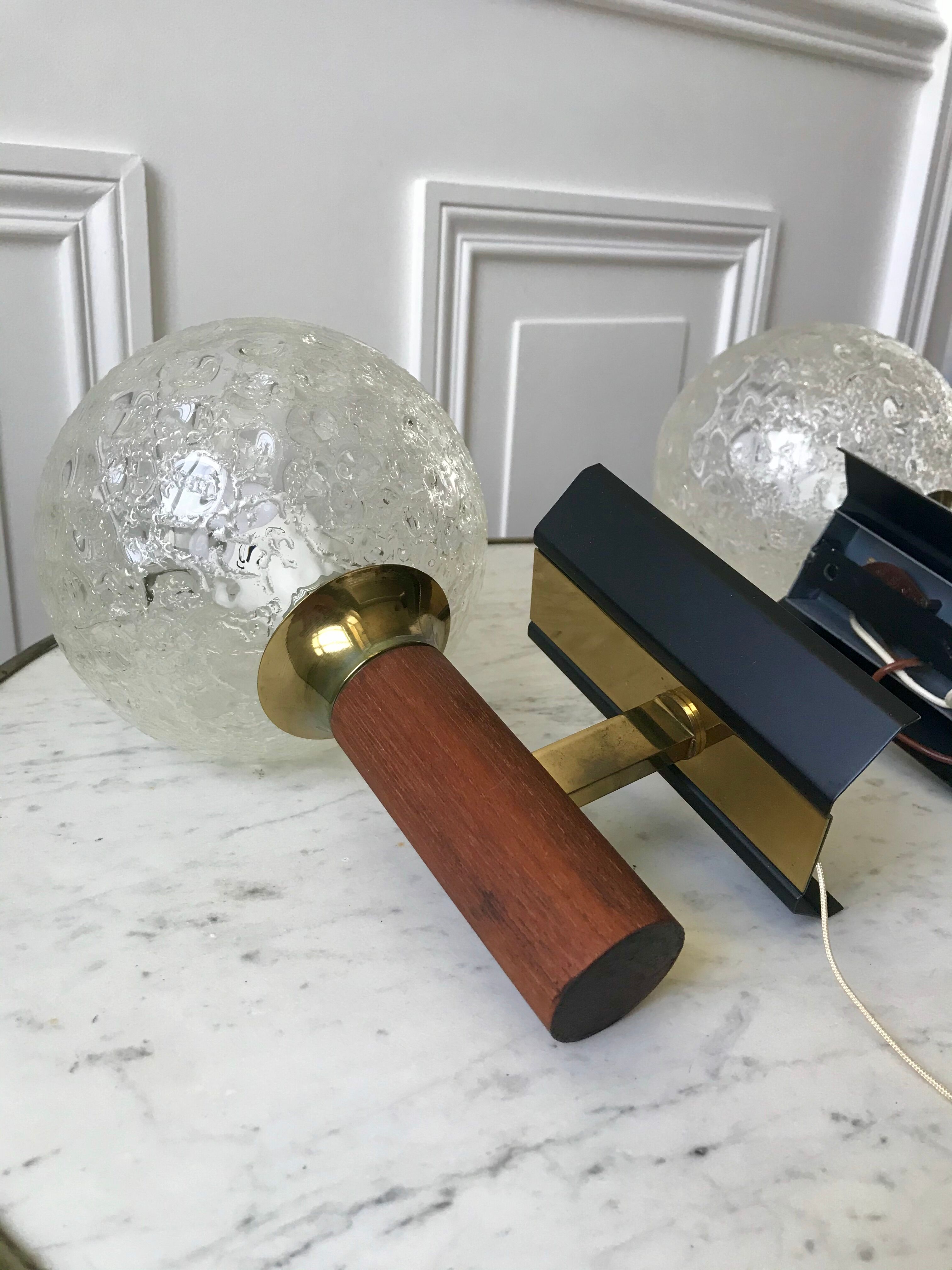 Pair of wall sconces balls in blown glass, metal and teak style 50s