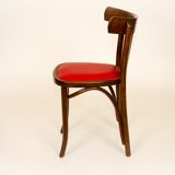 Bistro chair with a studded seat