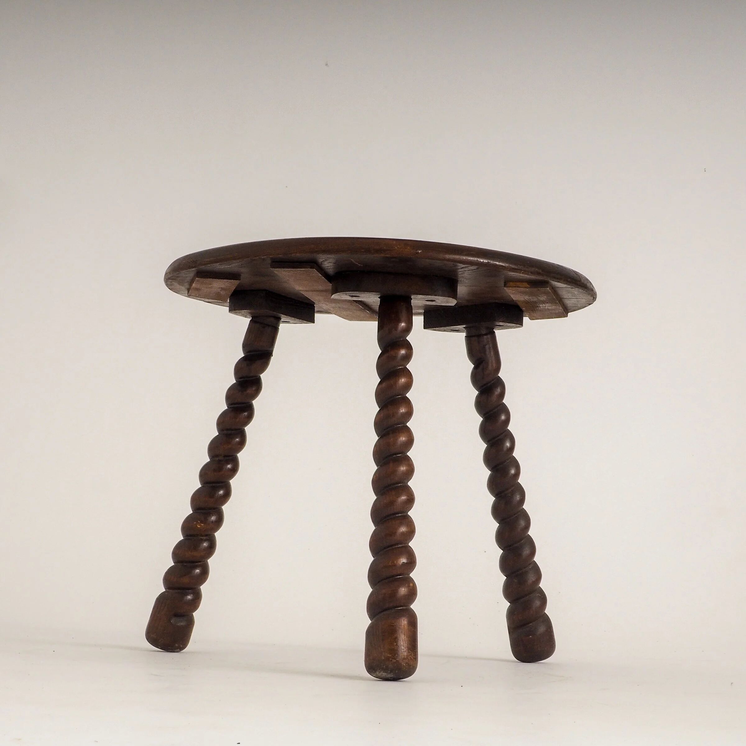 French oak tripod side table attributed to Charles Dudouyt