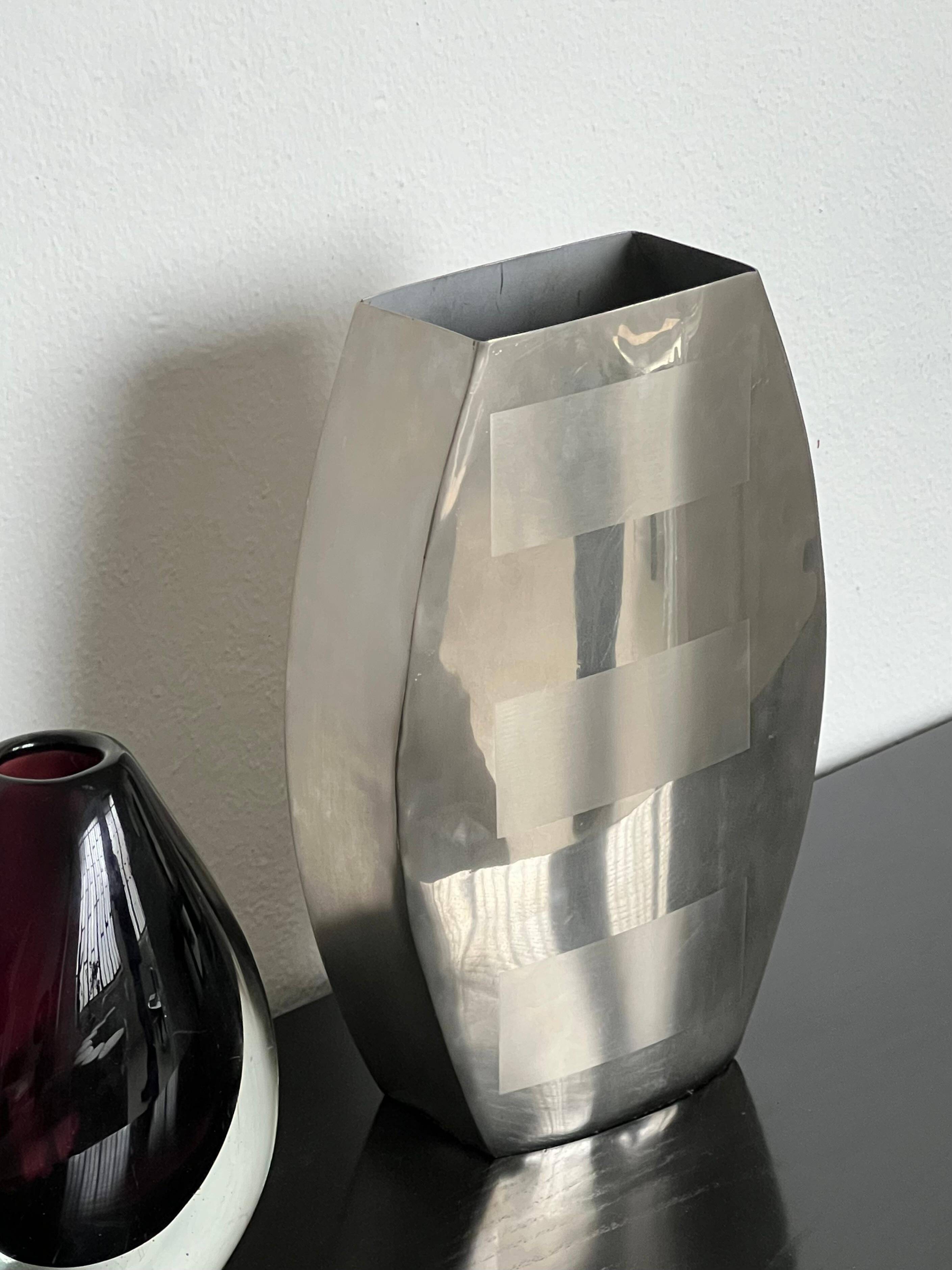 Decorative stainless steel vase with geometrical shapes imprinted, 1970's