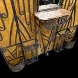 Maison Moutard: Monumental coat rack from the Art Nouveau period in wrought iron.