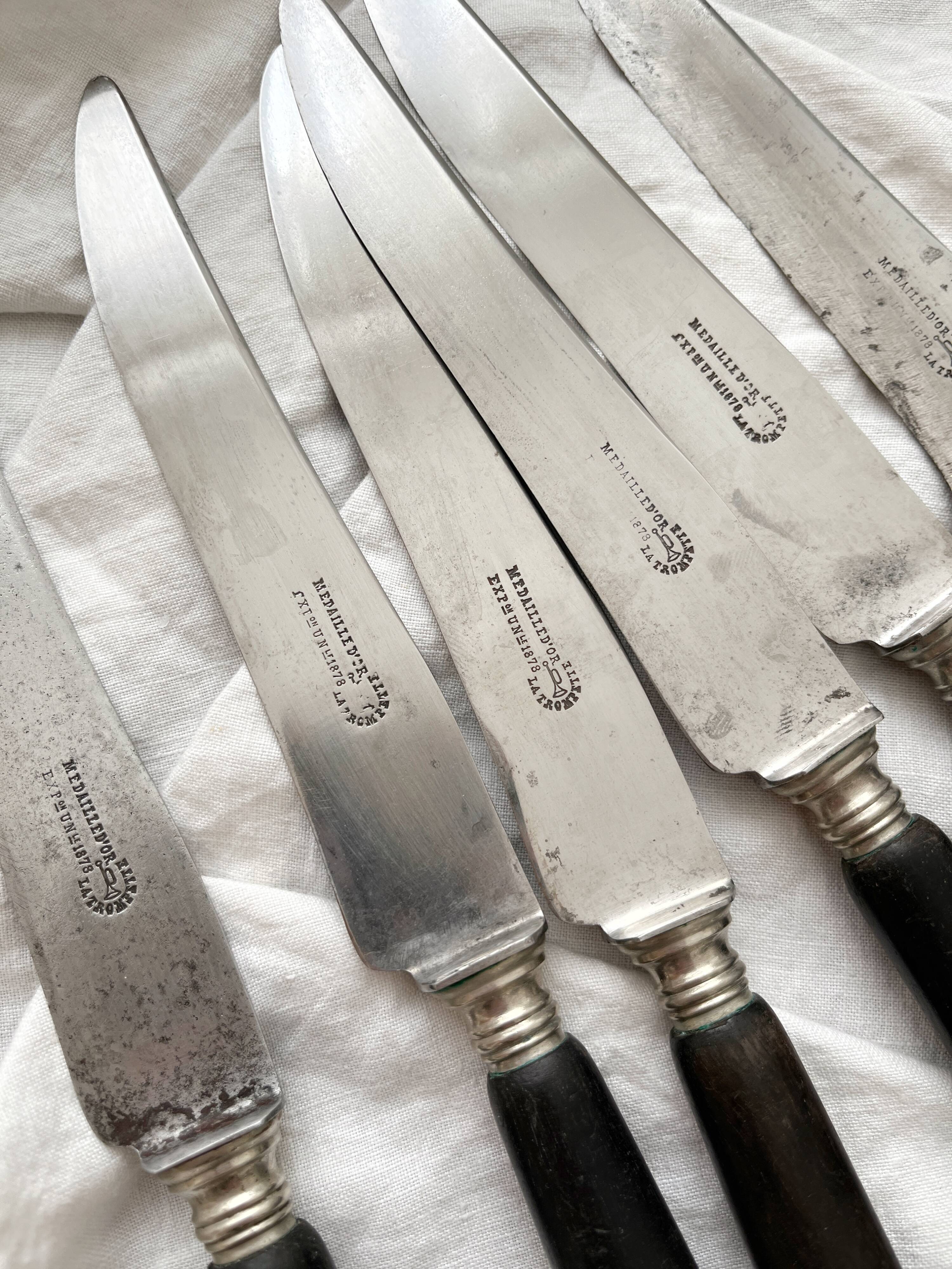 6 antique black wooden table knives La Trompette, late 19th century