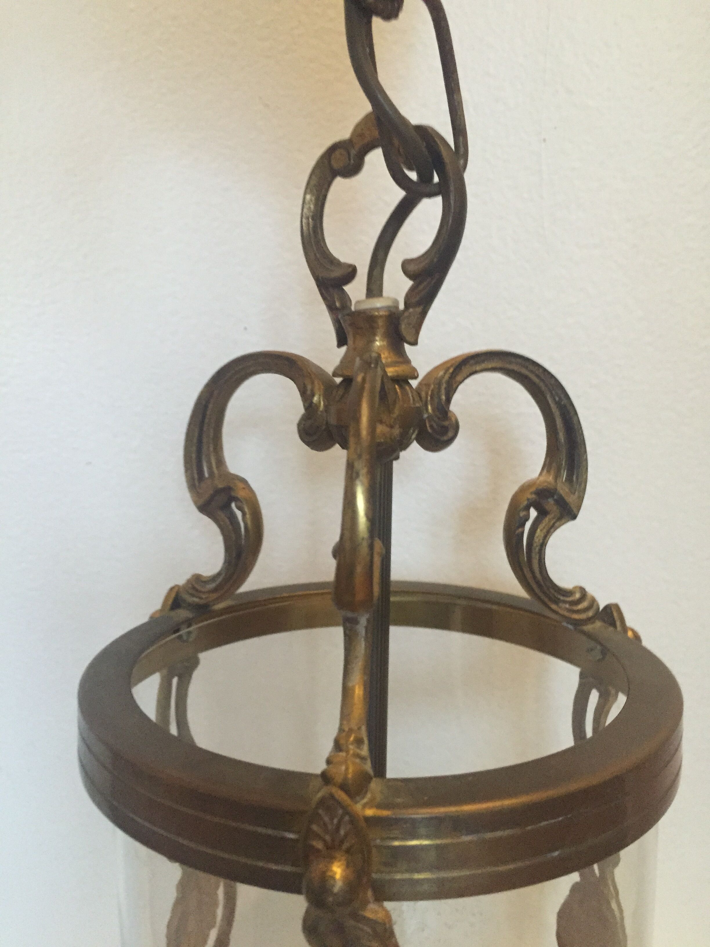 Old lantern in bronze and glass